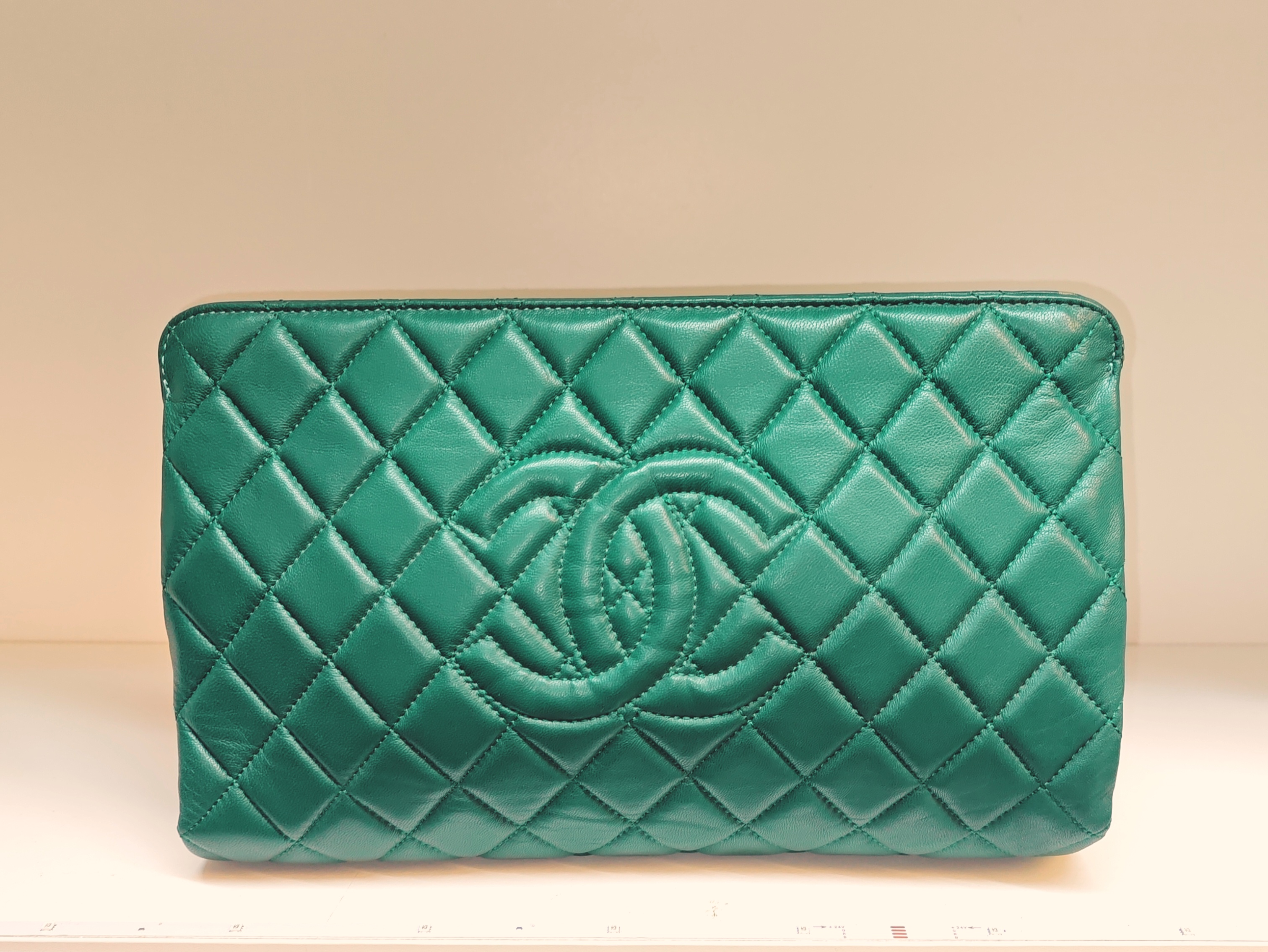 Emerald green clutch bag